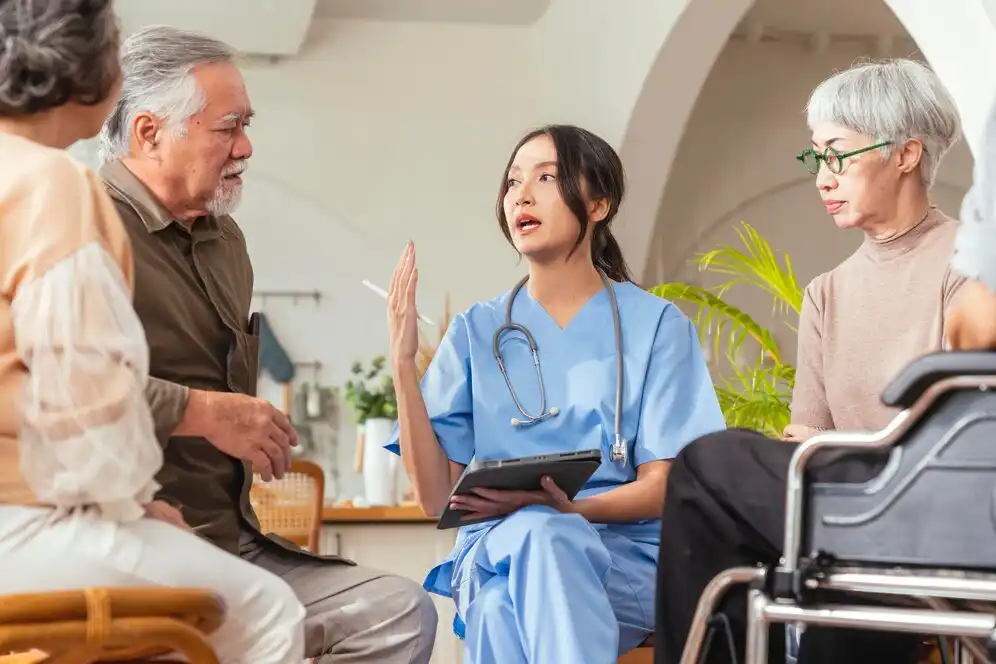Trained caregiver giving advice to the elderly