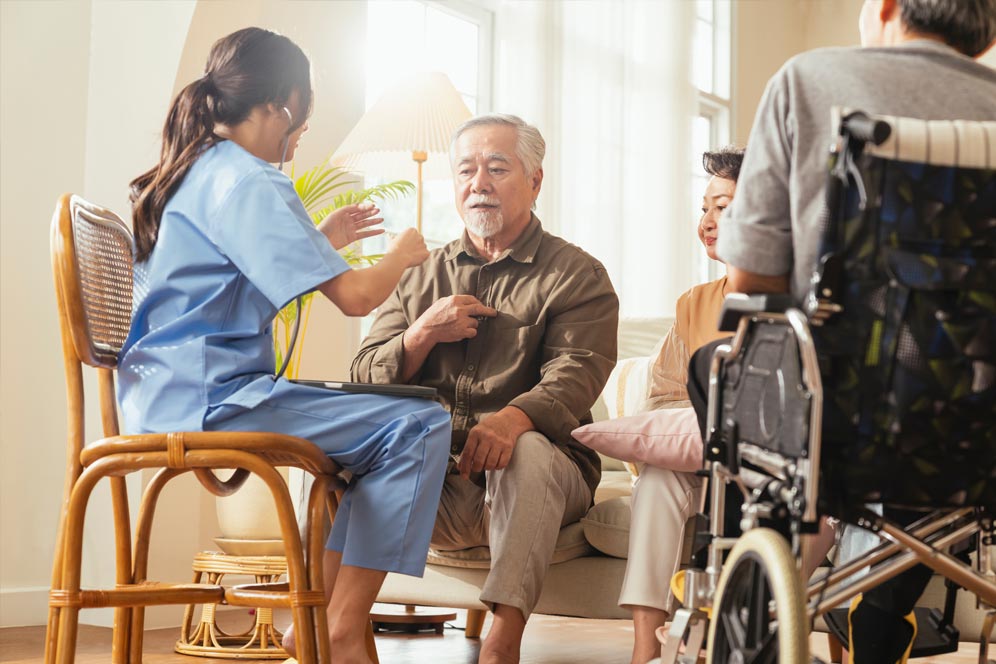 Caretaker attending to the elderly
